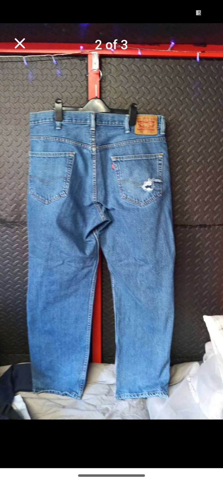 Genuine Levi’s 550 blue jeans with distressed pocket, W38 L32, photo 2